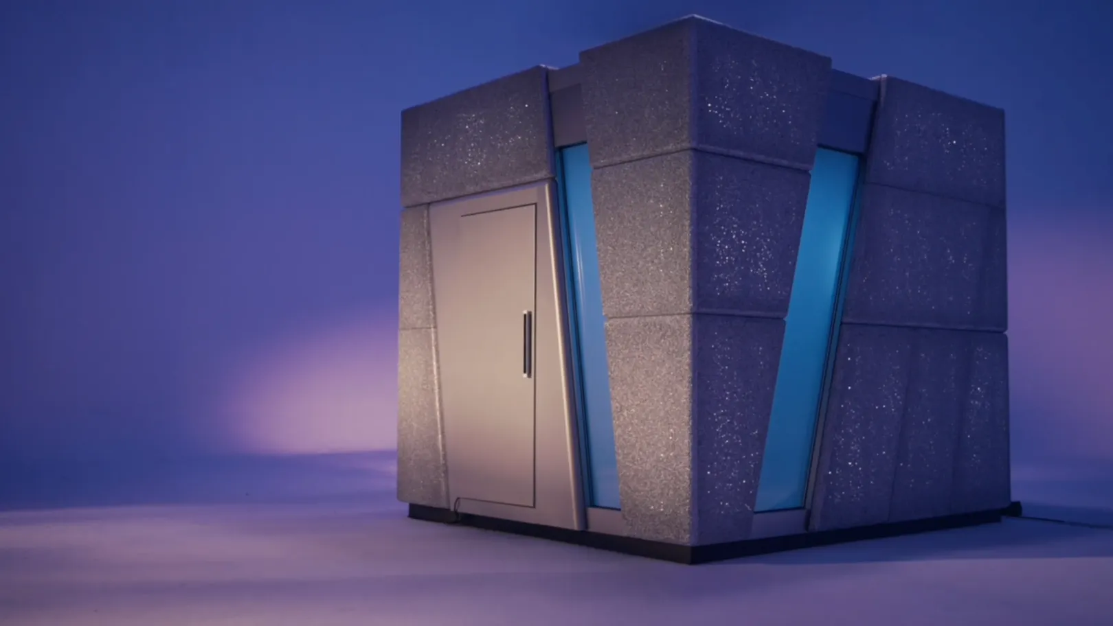 Blue-lit exterior view of L-Space